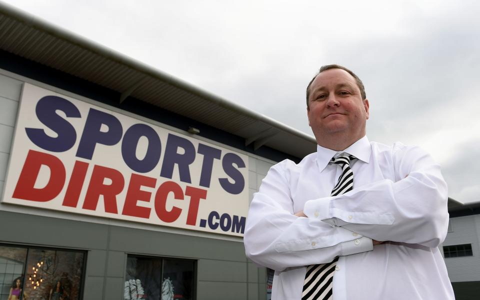 Mike Ashley infront of Sports Direct's warehouse in Shirebrook - PA Wire/PA Images