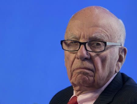 Rupert Murdoch, executive chairman of News Corporation, reacts during a panel discussion at the B20 meeting of company CEOs in Sydney, July 17, 2014. REUTERS/Jason Reed/File Photo