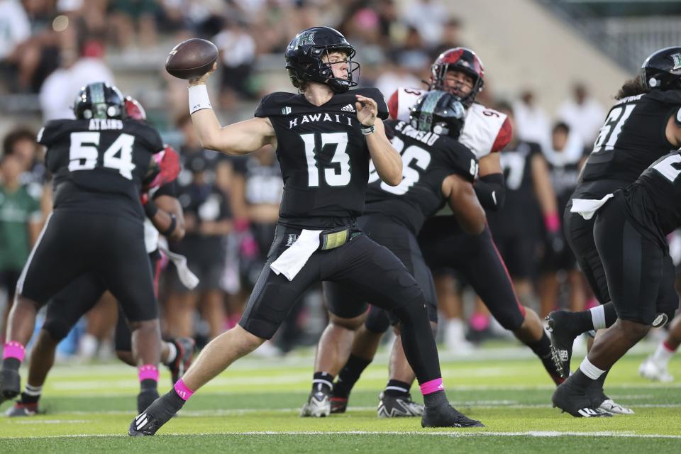 Hawaii quarterback Brayden Schager (13) in action against San Diego State during a NCAA college football game on Saturday, Oct. 14, 2023, in Honolulu. | Marco Garcia, Associated Press