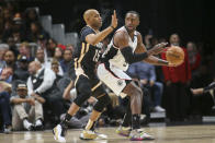 Atlanta Hawks guard Vince Carter (15) defends Los Angeles Clippers forward Patrick Patterson (54) in the first half of an NBA basketball game Wednesday, Jan. 22, 2020, in Atlanta, Ga. (AP Photo/Brett Davis)