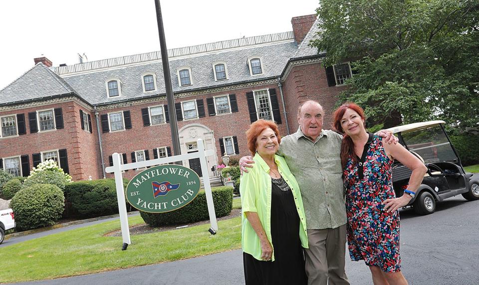 From left, Judy, Gerry and daughter Suzy Butler Callaghan in front of their Cohasset home, where the film "Confess, Fletch" is being filmed. Sunday. Aug. 1, 2021.