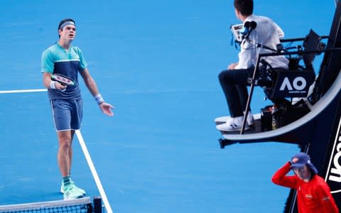 Milos Raonic argues with the umpire - Credit: getty images