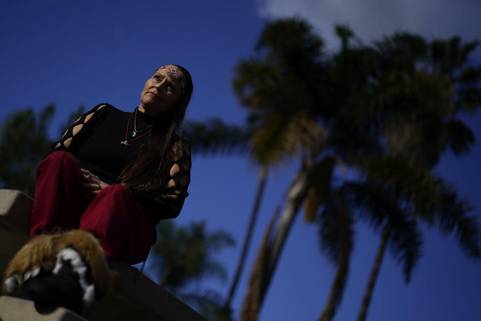 Moonlight Pulido poses for a portrait Wednesday, Dec. 7, 2022, in Los Angeles. California is paying reparations to victims, mostly women, who were either forcibly or coercively sterilized by the government. Pulido was sterilized while incarcerated in 2005. (AP Photo/Marcio Jose Sanchez)