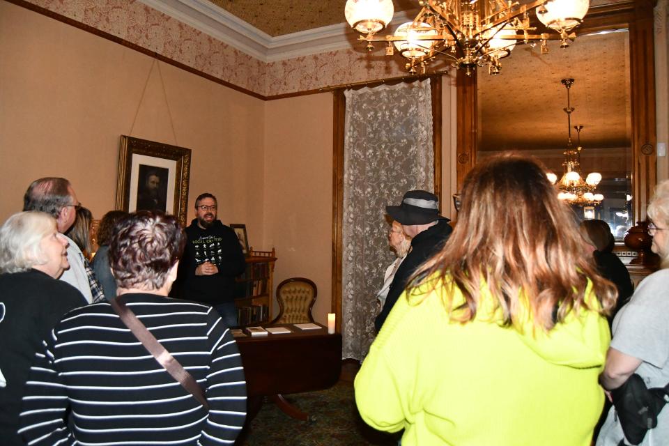 Ken Moore, curator of artifacts at the Rutherford B. Hayes Presidential Library and Museums, tells the tale of Elmore's headless motorcyclist during the Spirit Stories of Spiegel Grove tour.