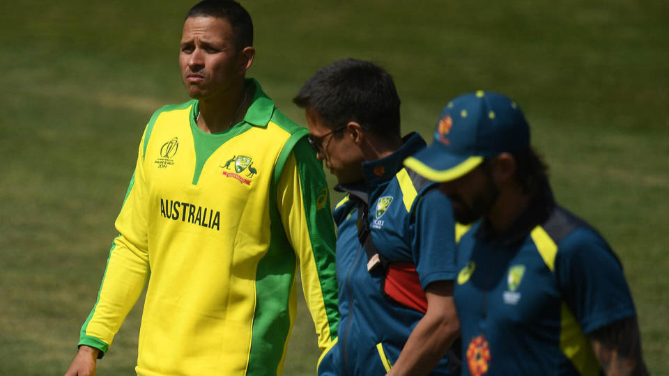 Usman Khawaja walks off. (Photo by Harry Trump/Getty Images)