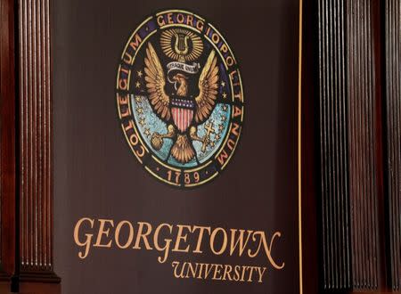 The seal of Georgetown University is seen as President John DeGioia speaks about moves aimed at acknowledging and encouraging dialogue about the Jesuit-run university's ties to slavery in Washington, September 1, 2016. REUTERS/Joshua Roberts