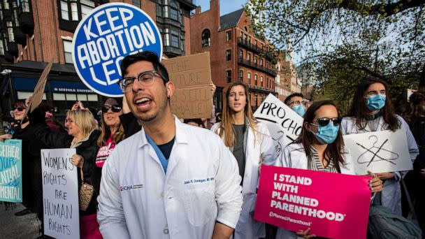 PHOTO: In this May 3, 2022, file photo, a group of doctors and medical workers join protesters gathering in front of the State House to show support and rally for abortion rights in Boston. (Joseph Prezioso/AFP via Getty Images, FILE)