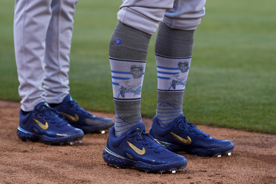 St. Louis Cardinals' Iván Herrera wears socks honoring Jackie Robinson Day before a baseball game against the Oakland Athletics, Monday, April 15, 2024, in Oakland, Calif. (AP Photo/Godofredo A. Vásquez)