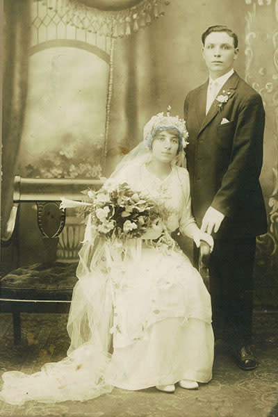 <div class="caption-credit"> Photo by: bridalguide.com</div><div class="caption-title">1910s</div>The 1910s introduce a more flowing silhouette for wedding gowns. Dancing also becomes a popular part of the wedding celebration, with phonographs providing background music. In this decade women, as a result of the Suffrage movement, begin to assert their independent choices about what kind of wedding they want to have. Note: now the bride is seated and the husband stands behind.