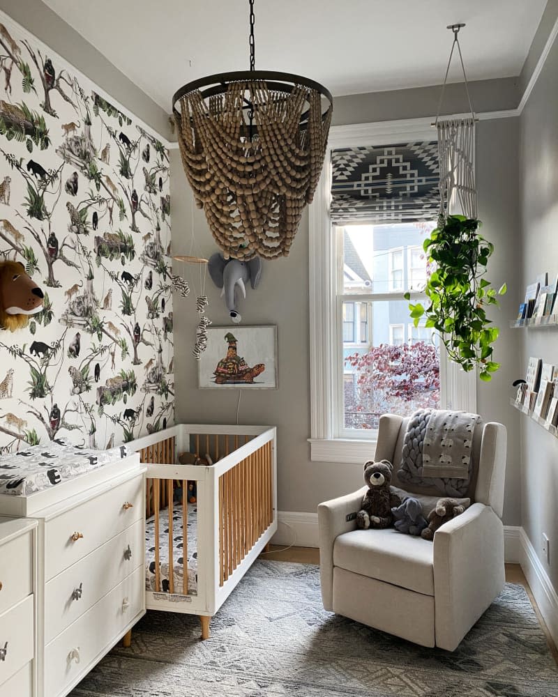 gray nursery with animal print, textured fabrics, and boho details