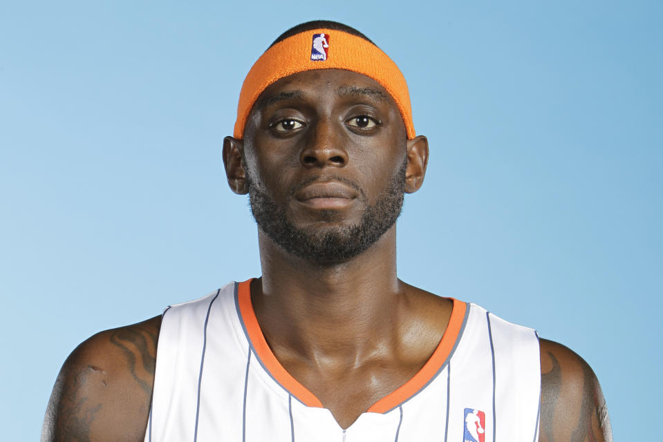 FILE - Charlotte Bobcats' Darius Miles poses for a photo during media day for the NBA basketball team in Charlotte, N.C., in this Monday, Sept. 27, 2010, file photo. Eighteen former NBA players, including Miles, have been arrested on charges alleging they defrauded the league's health and welfare benefit plan out of about $4 million, according to an indictment Thursday, Oct. 7, 2021. (AP Photo/Chuck Burton, File)