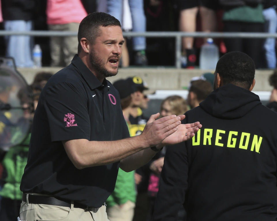 Oregon head coach Dan Lanning walks the field during warmups before an NCAA college football game against UCLA Saturday, Oct. 22, 2022, in Eugene, Ore. (AP Photo/Chris Pietsch)