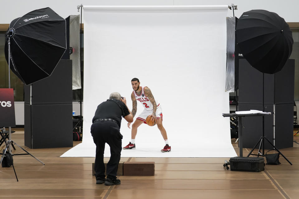 Chicago Bulls guard Lonzo Ball poses for a photographer during the NBA basketball team's media day, Monday, Oct. 2, 2023, in Chicago. (AP Photo/Charles Rex Arbogast)