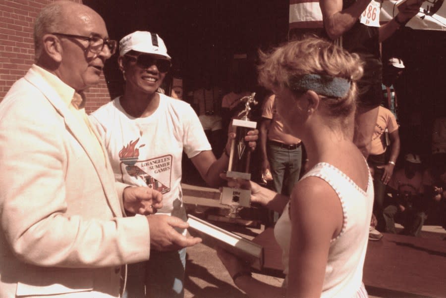 Patti Marquees being presented with a trophy from Wilma Rudolph back in August of 1984. (Source: Patti Marquees) 
