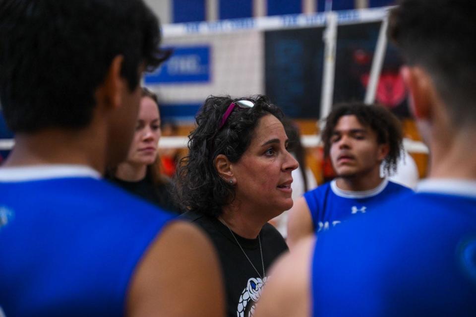 Park Vista head coach Erica Green speaks to the team prior to the start of the state championship regional final between host Park Vista and Seminole Ridge at Lake Worth Beach, FL., on Tuesday, May 10, 2022. Final score, Park Vista 3, Seminole Ridge, 2.