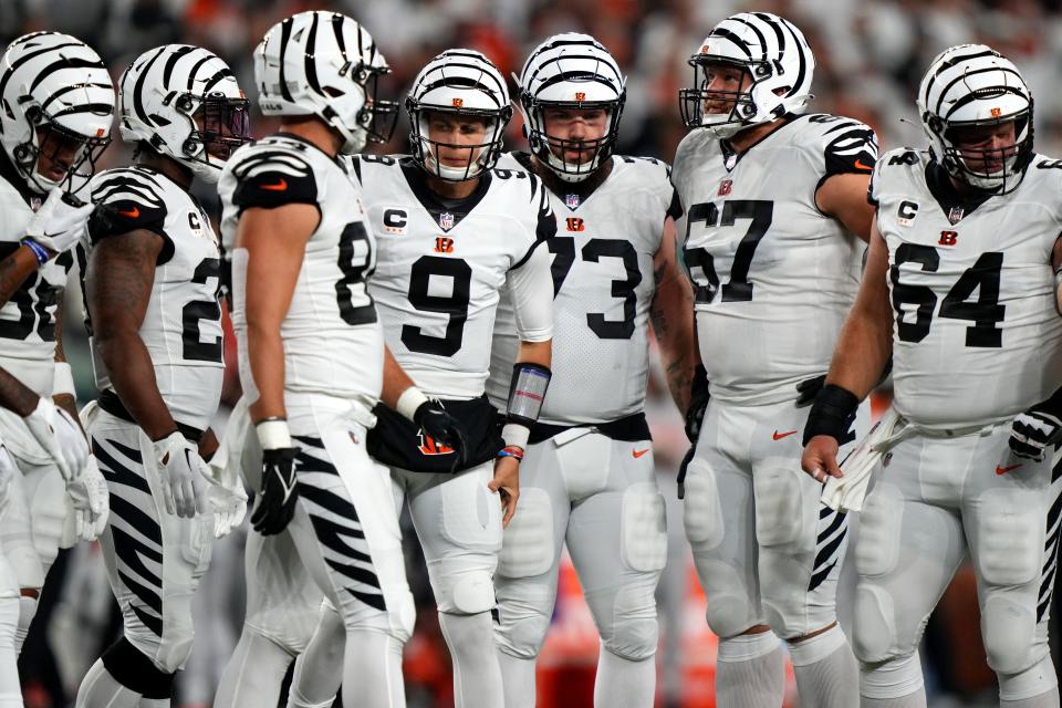 Cincinnati Bengals quarterback Joe Burrow enters the offensive huddle.