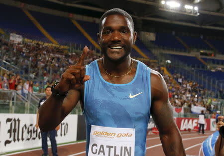 Justin Gatlin from the U.S. celebrates after winning the men's 100 meters event during the Golden Gala IAAF Diamond League at the Olympic stadium in Rome, Italy June 4, 2015. REUTERS/Giampiero Sposito