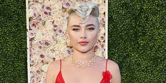 Florence Pugh frees the nip in a see-through red dress at the 2024 Golden  Globes