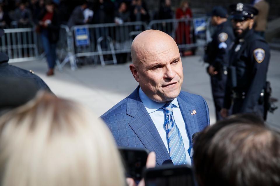 Harvey Weinstein's defense attorney Attorney Arthur Aidala speaks to reporters outside a Manhattan courthouse after the split verdict in Weinstein's sex-crimes trial, Feb. 24, 2020, in New York.