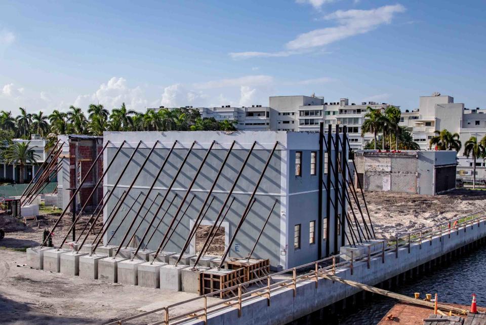 Only a few walls, supported by long metal rods, remain of the old historic Royal Poinciana Playhouse in Palm Beach as workers continue their efforts to renovate the site August 10, 2023.