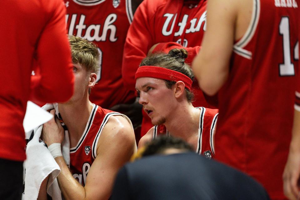 Utah Utes guard Gabe Madsen (55) and his teammates circle up during a timeout during a men’s basketball game against the Brigham Young Cougars at the Jon M. Huntsman Center in Salt Lake City on Saturday, Dec. 9, 2023. | Megan Nielsen, Deseret News
