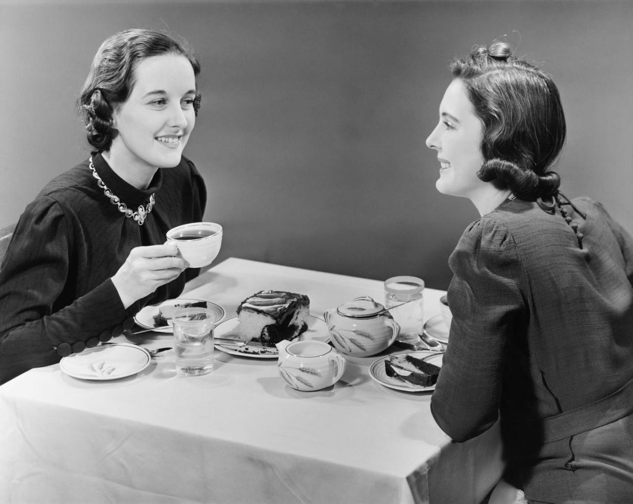 two women having coffee and cake