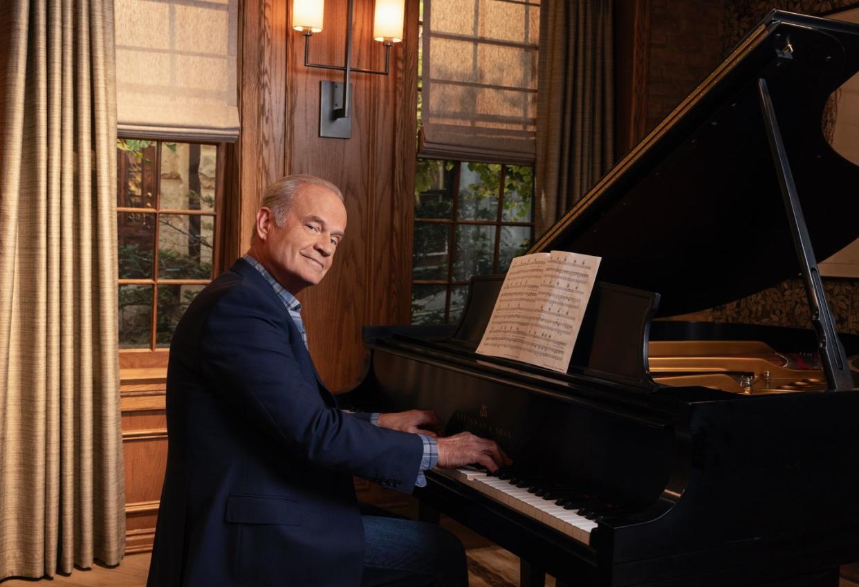 kelsey grammer playing a piano