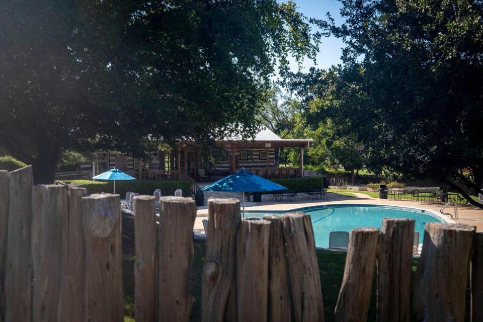 A century-old log cabin was converted to a clubhouse featuring a community pool in the Marine Creek Ranch neighborhood in Fort Worth, Texas, on Thursday, Sept. 15, 2022.