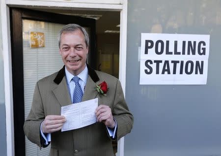 Nigel Farage, the leader of the United Kingdom Independence Party (UKIP) arrives to vote in Ramsgate, southern England, May 7, 2015. REUTERS/Suzanne Plunkett