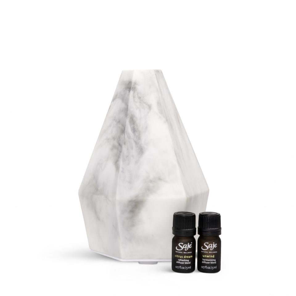 <p><em><strong>Brittany Talarico, Senior Style Editor</strong></em>: Making your WFH space as zen as possible is really important. Enter this Saje diffuser which will make any room more tranquil.</p> <p><strong>Buy it!</strong> Saje Morning to Night Diffuser Kit, $80; <a href="https://www.saje.com/product/morning-to-night-kit-707278.html" rel="nofollow noopener" target="_blank" data-ylk="slk:saje.com;elm:context_link;itc:0;sec:content-canvas" class="link ">saje.com</a></p>