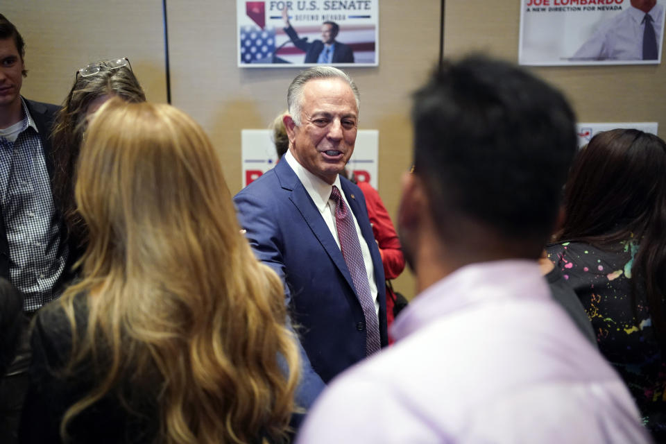 Clark County Sheriff Joe Lombardo, Republican candidate for governor of Nevada, greets supporters after speaking during an election night campaign event Tuesday, Nov. 8, 2022, in Las Vegas. (AP Photo/John Locher)