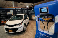 FILE PHOTO: An official New York State electric car is displayed in a New York State exhibit at the 2019 New York International Auto Show in New York City, U.S, April 17, 2019. REUTERS/Brendan McDermid/File Photo/File Photo