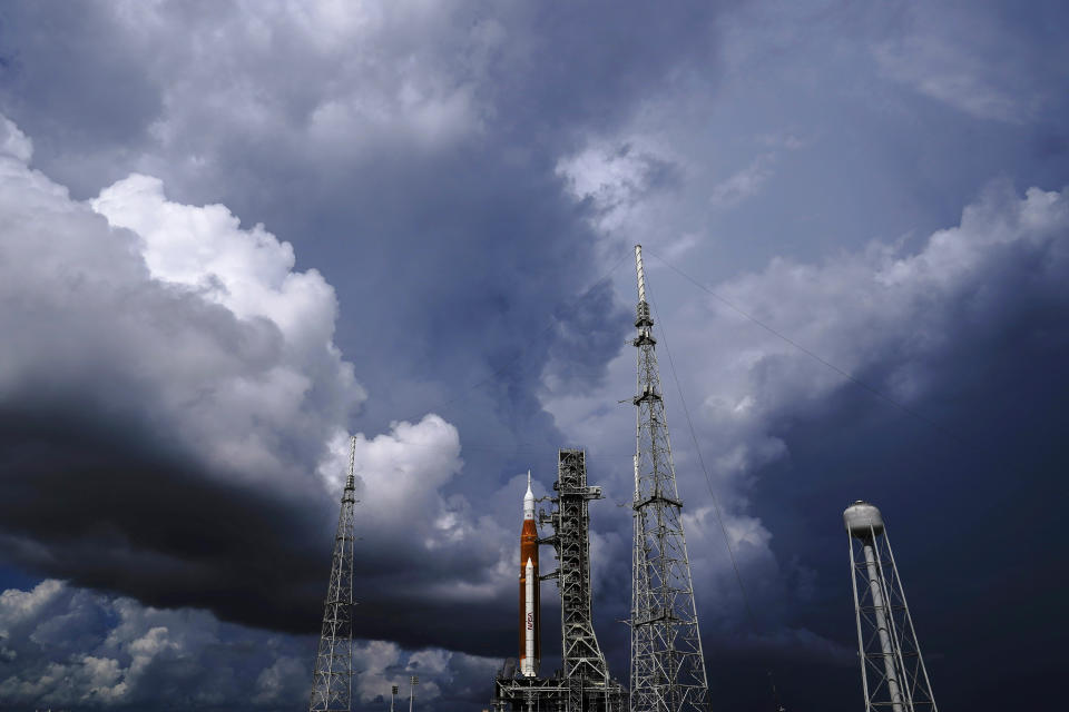 FILE - The NASA moon rocket stands on Pad 39B before a launch attempt for the Artemis 1 mission to orbit the moon at the Kennedy Space Center on Sept. 2, 2022, in Cape Canaveral, Fla. NASA mission managers decided Monday, Sept. 26, 2022, to move its moon rocket off the launch pad and into shelter due to Hurricane Ian's uncertain path. (AP Photo/Brynn Anderson, File)