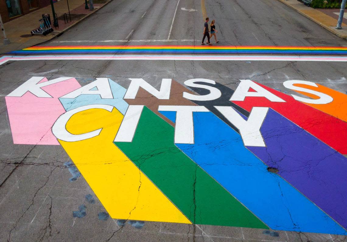 With support from LGBTQ Commission of Kansas City, volunteers showed up and painted over two days to complete “Crosswalks to Pride,” a rainbow crosswalk with the words ‘Kansas City’ emblazoned across the intersection of Broadway Boulevard and Westport Road on Tuesday, June 6, 2023 in Kansas City. June is LGBTQ+ Pride Month and events are scheduled throughout the month.