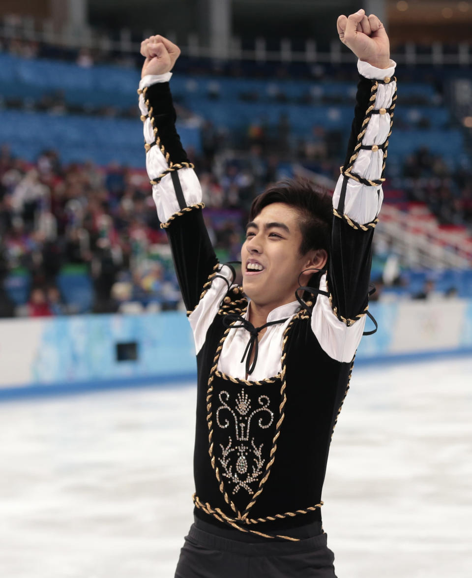 Michael Christian Martinez of the Philippines gestures as he leaves the ice after the men's short program figure skating competition at the Iceberg Skating Palace during the 2014 Winter Olympics, Thursday, Feb. 13, 2014, in Sochi, Russia. (AP Photo/Ivan Sekretarev)