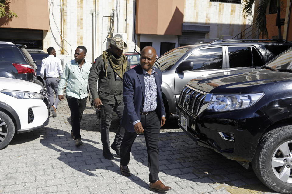 Former Senator Cholzer Chancy arrives to court for questioning before the investigating judge in a corruption case in Port-au-Prince, Haiti, Monday, Jan. 8, 2024. A judge in Haiti has issued arrest warrants for more than 30 high-ranking officials related to the alleged misappropriation of funds or equipment connected to Haiti’s National Equipment Center. (AP Photo/Odelyn Joseph)