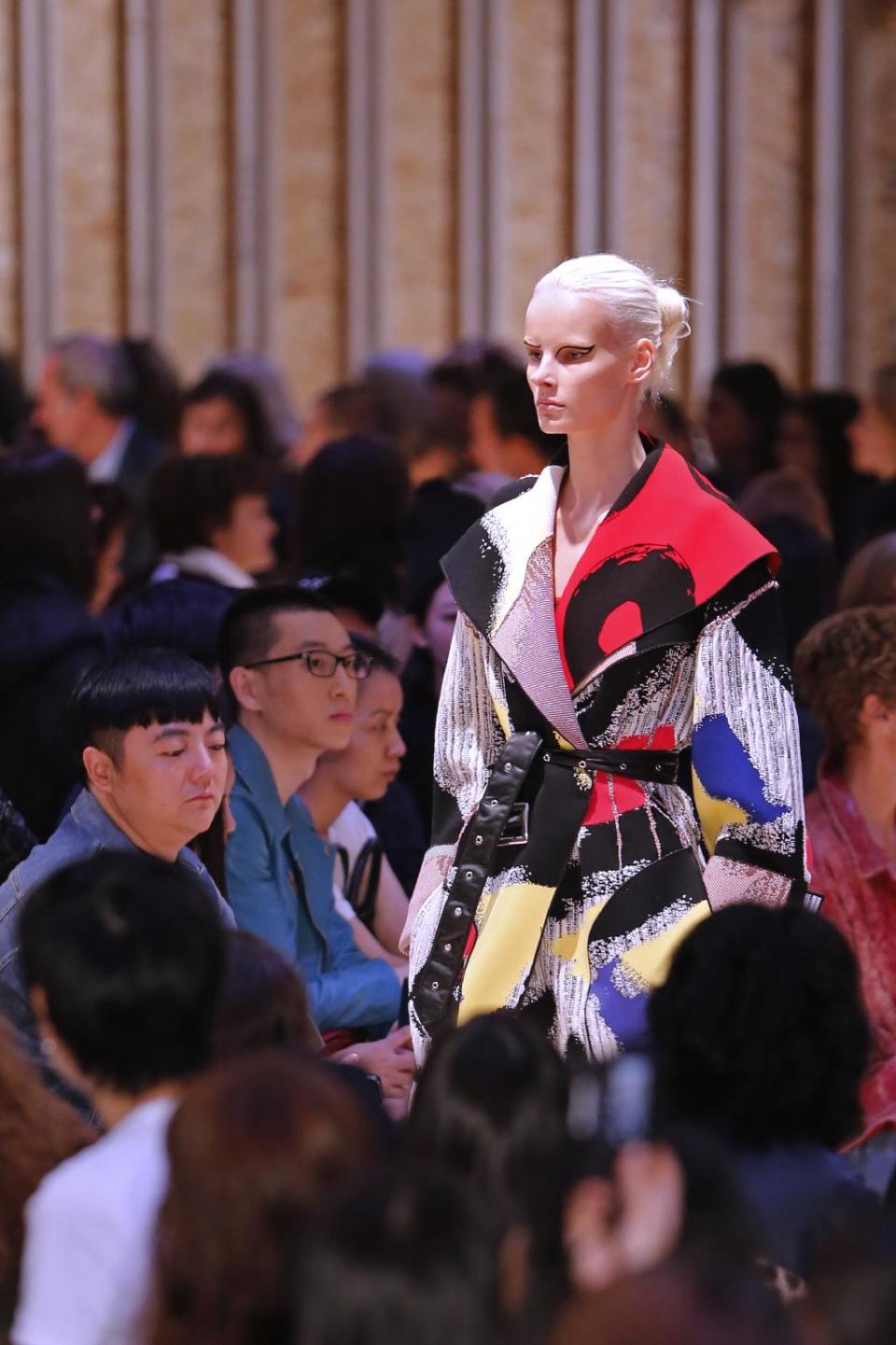 A model presents a creation as part of Celine's ready-to-wear Spring/Summer 2014 fashion collection, presented Sunday, Sept. 29, 2013 in Paris. (AP Photo/Jacques Brinon)