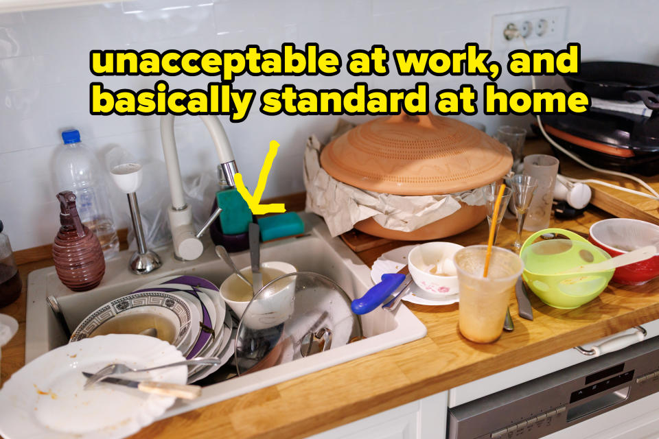 A kitchen sink full of dirty dishes and utensils, with pots and other kitchen items cluttering the countertop