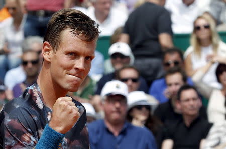 Tomas Berdych of the Czech Republic reacts after defeating Gael Monfils of France during their semi-final match at the Monte Carlo Masters in Monaco April 18, 2015. REUTERS/Jean-Paul Pelissier