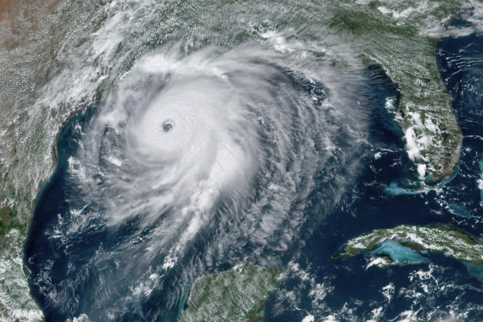 This GOES-16 GeoColor satellite image taken Wednesday, Aug. 26, 2020, at 2:40 p.m. EDT., and provided by NOAA, shows Hurricane Laura over the Gulf of Mexico. Hurricane Laura strengthened Wednesday into “an extremely dangerous Category 4 hurricane," The National Hurricane Center said. Laura is expected to strike Wednesday night into Thursday morning along the Louisiana-Texas border. (NOAA via AP)