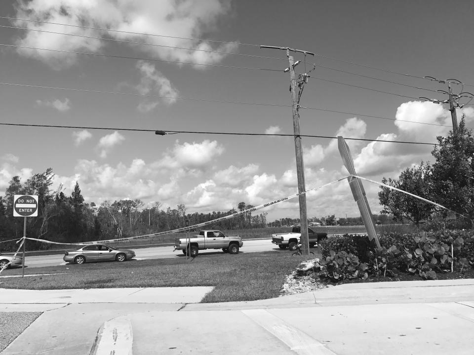 <p>Cars wait in a line that extended miles at one of the few gas stations open in the aftermath of Hurricane Irma in Fort Myers, Fla., a region hit by massive fuel shortages. (Photo: Holly Bailey/Yahoo News) </p>