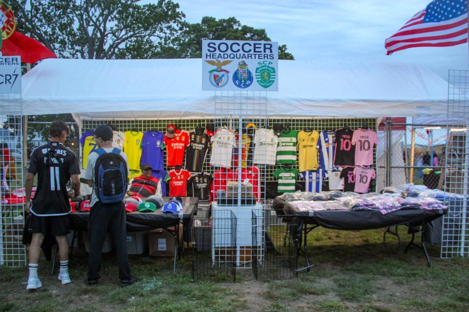 A booth sells soccer gear at the Great Feast of the Holy Ghost of New England on Thursday, Aug. 24, in Fall River.