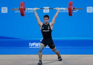 Cameron Mctaggart of New Zealand competes in the Men's 69kg Weightlifting on day three of the Nanjing 2014 Summer Youth Olympic Games.