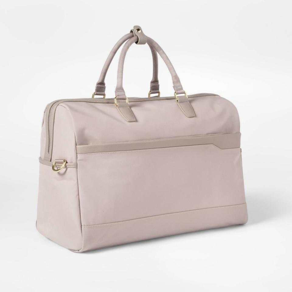 <p><a href="https://go.redirectingat.com?id=74968X1596630&url=https%3A%2F%2Fwww.target.com%2Fp%2Fsignature-weekender-bag-taupe-open-story-8482%2F-%2FA-77377090&sref=https%3A%2F%2Fwww.veranda.com%2Fshopping%2Fg60333759%2Fbest-travel-tote-bags%2F" rel="nofollow noopener" target="_blank" data-ylk="slk:Shop Now;elm:context_link;itc:0;sec:content-canvas" class="link ">Shop Now</a></p><p>Signature Weekender Bag</p><p>target.com</p><p>$79.99</p>