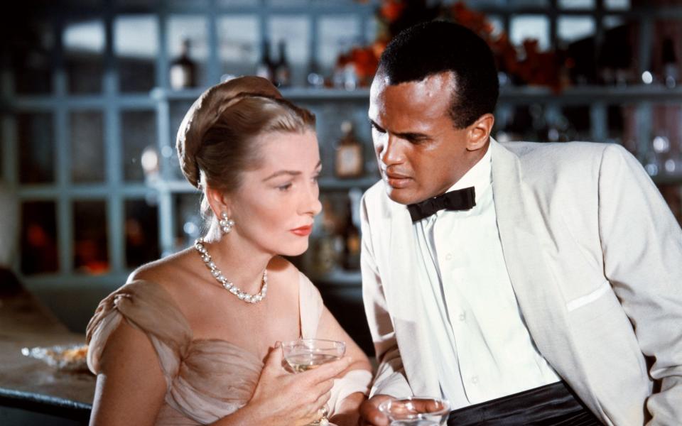 Harry Belafonte and Joan Fontaine in the 1957 film Island in the Sun - TCD/Prod.DB / Alamy Stock Photo