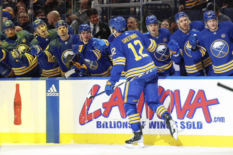 Buffalo Sabres left wing Jordan Greenway (12) celebrates his goal during the first period of an NHL hockey game against the Anaheim Ducks Monday, Feb. 19, 2024, in Buffalo, N.Y. (AP Photo/Jeffrey T. Barnes)