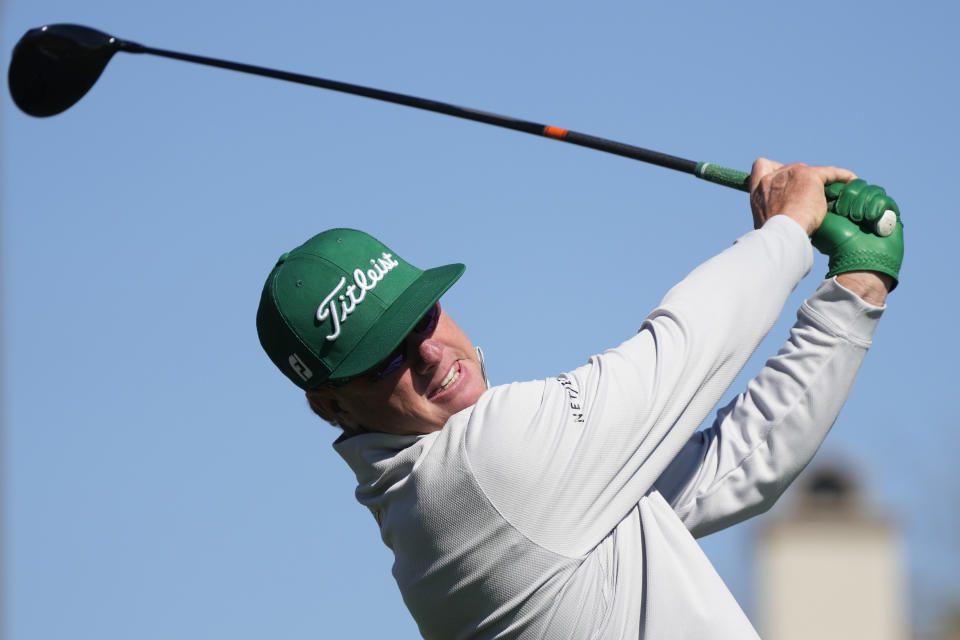 Charley Hoffman hits a tee shot at the second hole during the final round of the Phoenix Open golf tournament Sunday, Feb. 11, 2024, in Scottsdale, Ariz. (AP Photo/Ross D. Franklin)