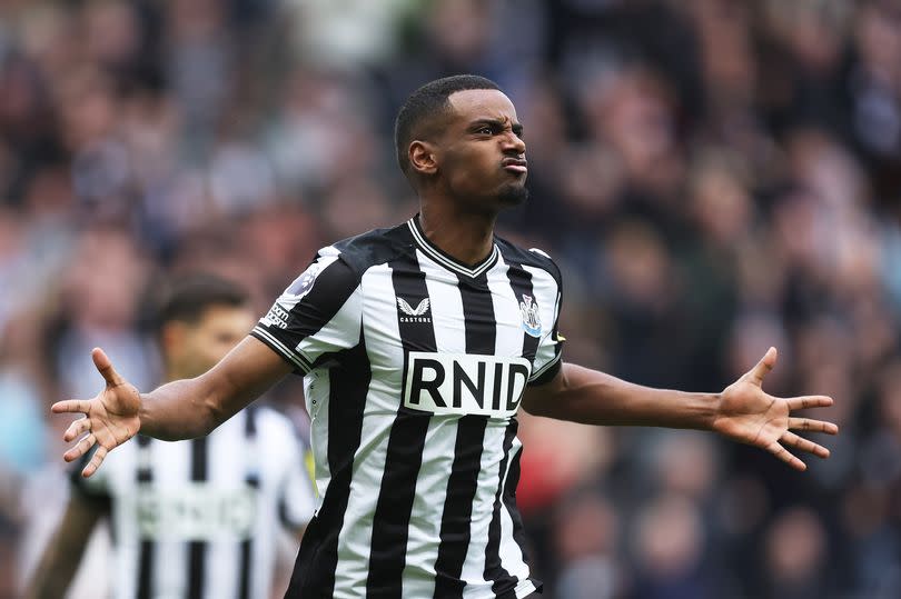 Alexander Isak of Newcastle United celebrates scoring his team's first goal during the Premier League match between Newcastle United and Tottenham Hotspur at St. James Park on April 13, 2024