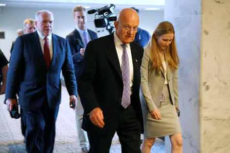 Former Director of National Intelligence (DNI) James Clapper departs from a Senate Intelligence Committee hearing evaluating the Intelligence Community Assessment on "Russian Activities and Intentions in Recent US Elections" on Capitol Hill in Washington, U.S., May 16, 2018. REUTERS/Joshua Roberts