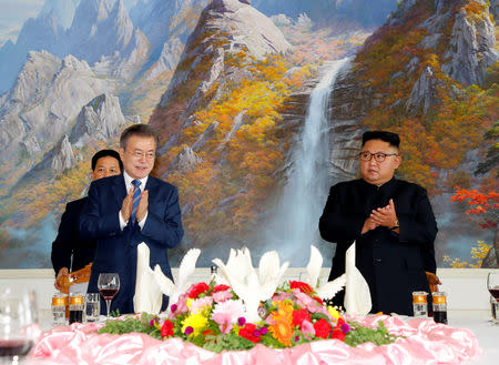 South Korean President Moon Jae-in and North Korean leader Kim Jong Un attend a luncheon in Pyongyang, North Korea, September 19, 2018. Pyeongyang Press Corps/Pool via REUTERS